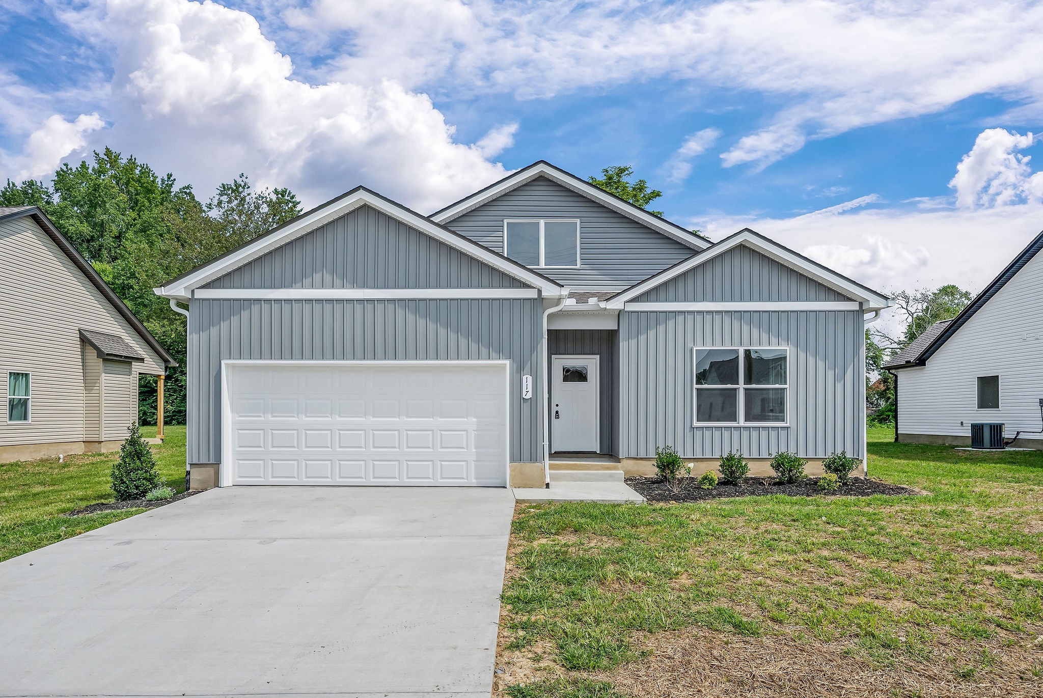 117 Reece Road Baxter, TN 38544 - Photo 1 of 31 a front view of a house with garden