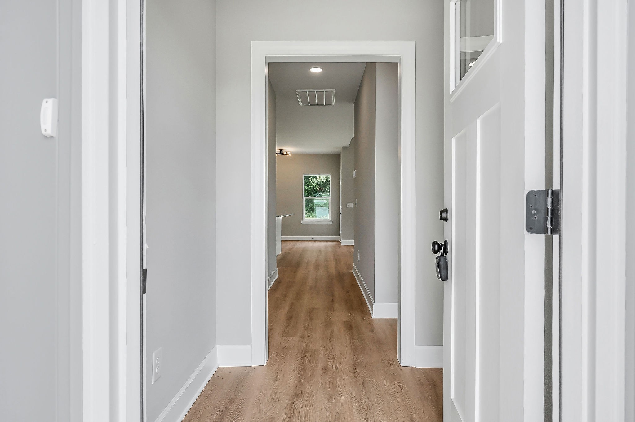 117 Reece Road Baxter, TN 38544 - Photo 2 of 31 a view of a hallway with wooden floor