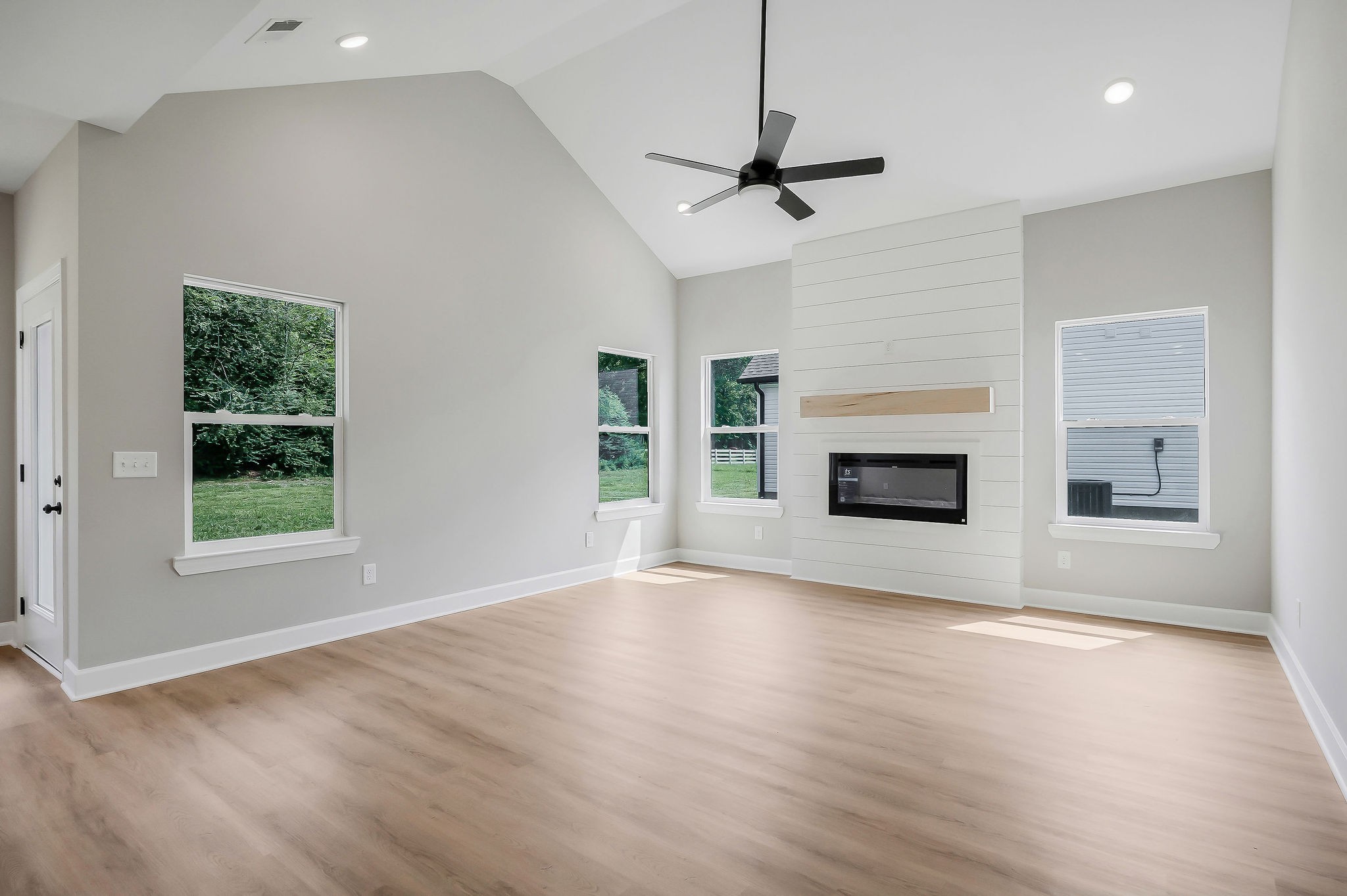 117 Reece Road Baxter, TN 38544 - Photo 4 of 31 a view of an empty room with window and fire place