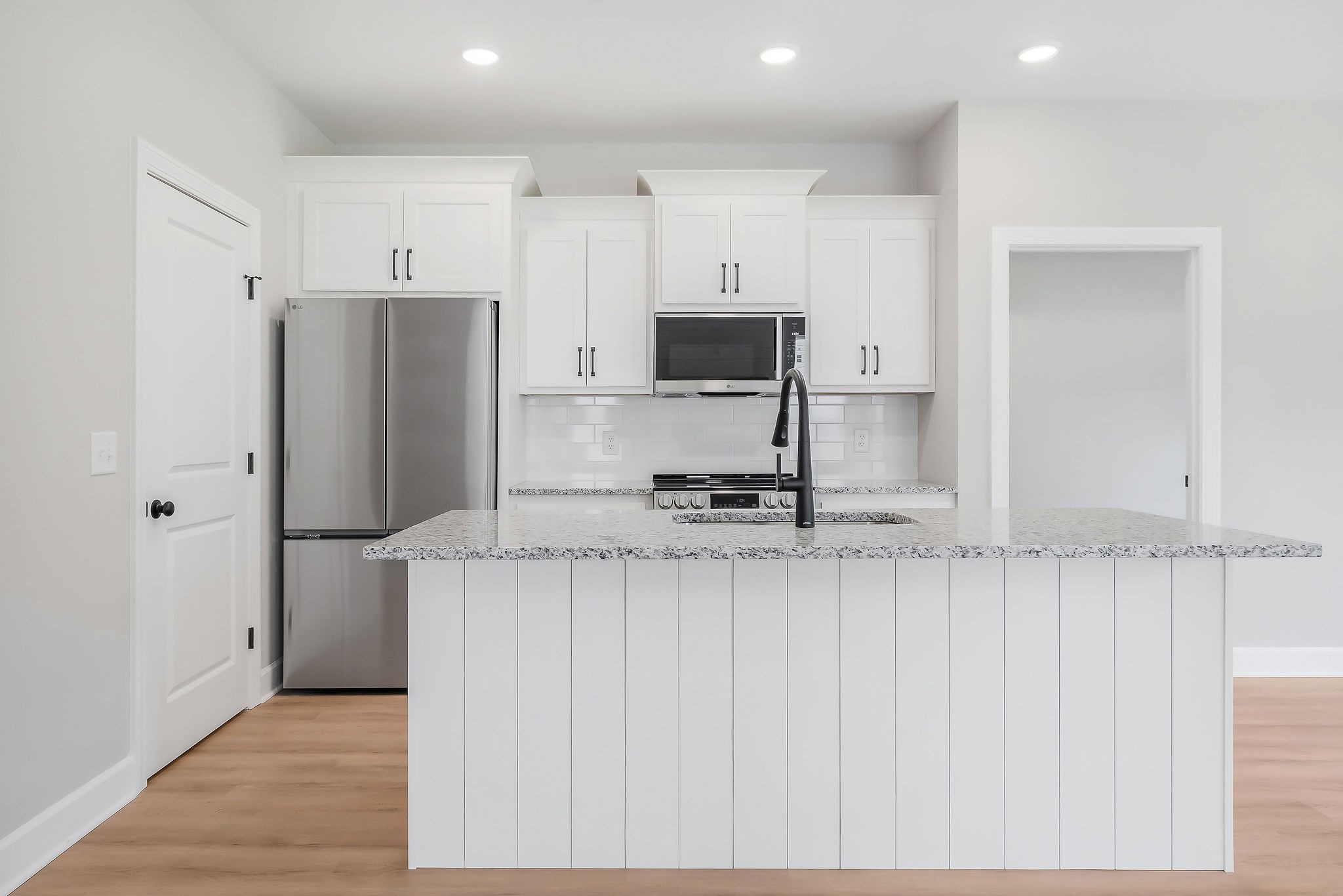 117 Reece Road Baxter, TN 38544 - Photo 7 of 31 a kitchen with stainless steel appliances a refrigerator and a stove
