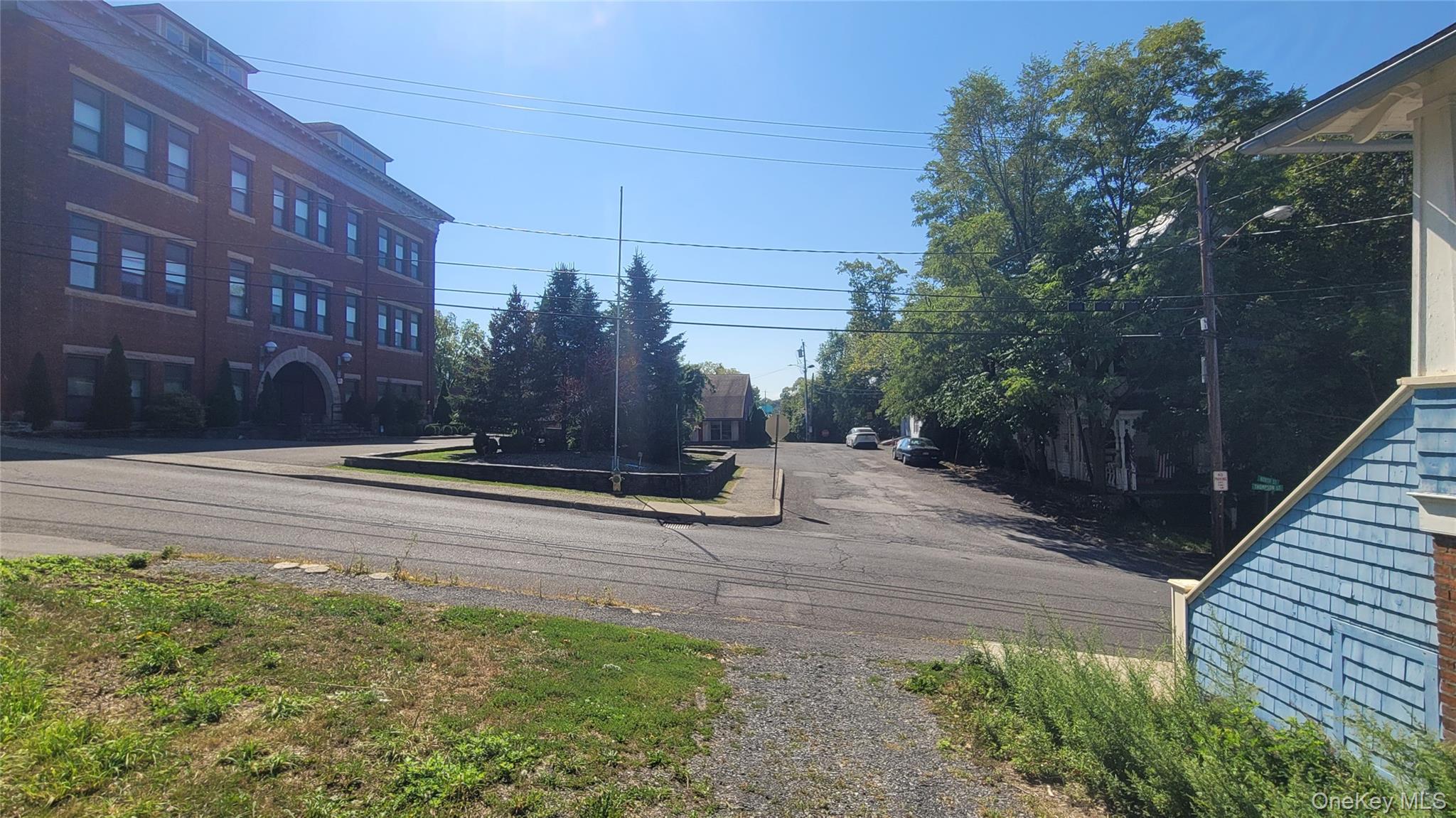 15 Thompson Street Catskill, NY 12414 - Photo 5 of 5 a view of street with brick building in front of it