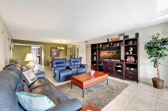 a view of a balcony with furniture