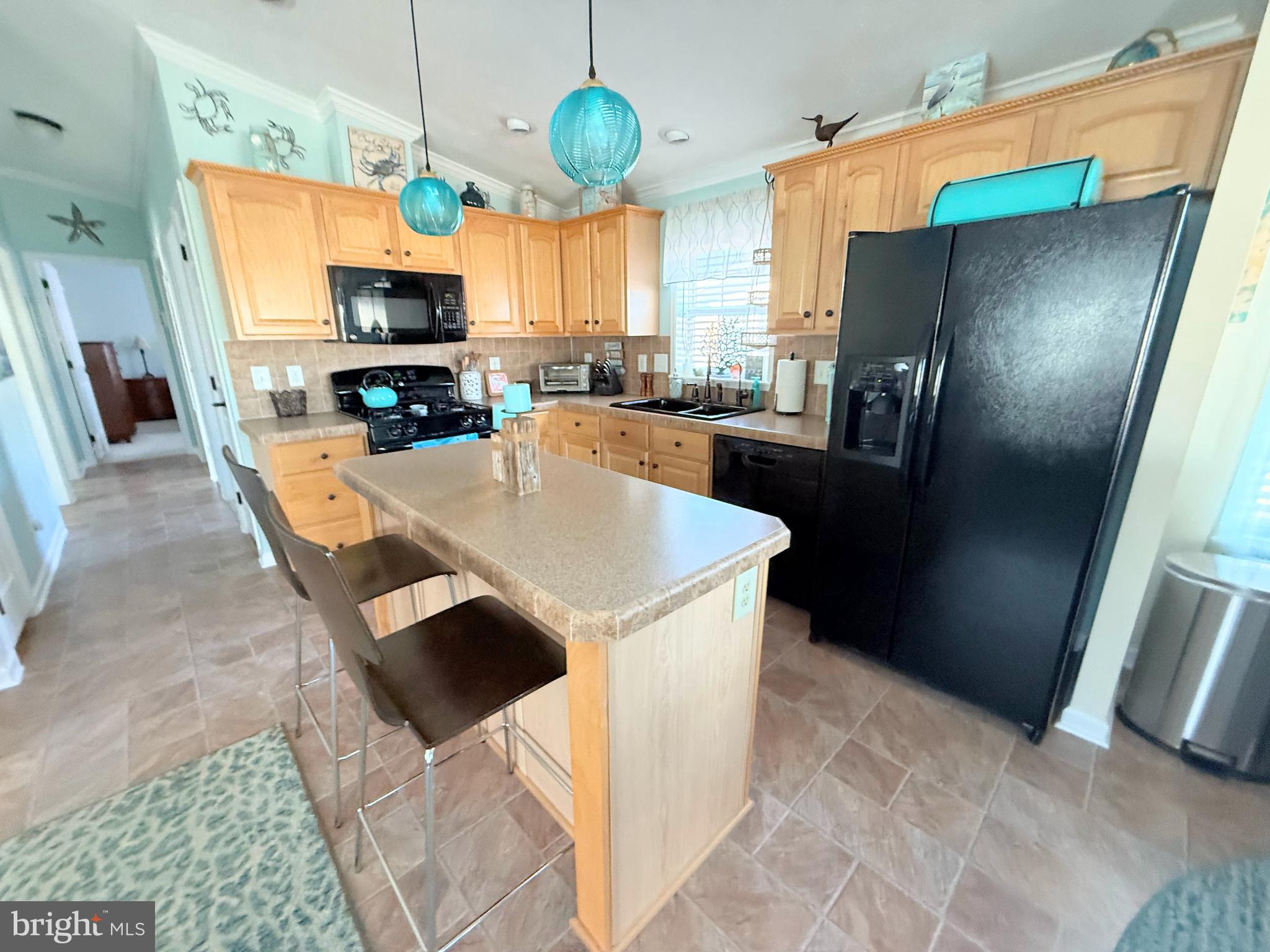 36812 Teal Road, Unit 53 Long Neck, DE 19966 - Photo 21 of 46 kitchen with island seating
