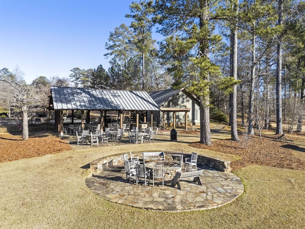 72 Buckeye Ridge Newnan, GA 30263 - Photo 61 of 79 a view of a swimming pool with sitting area