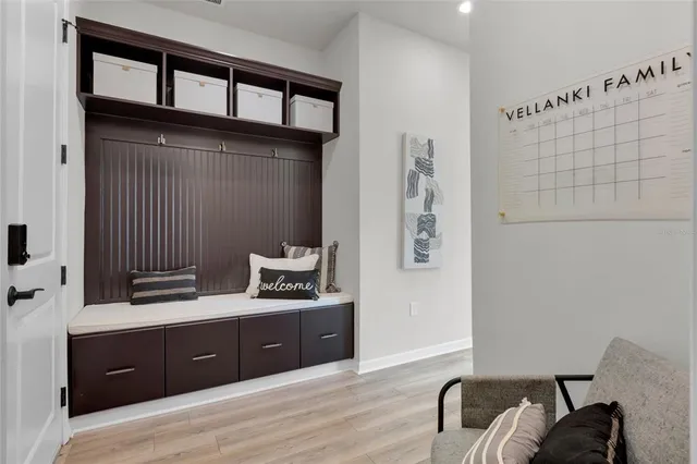 a spacious bathroom with a double vanity sink and a mirror