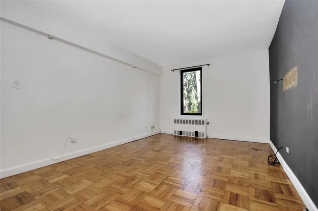 an empty room with a window