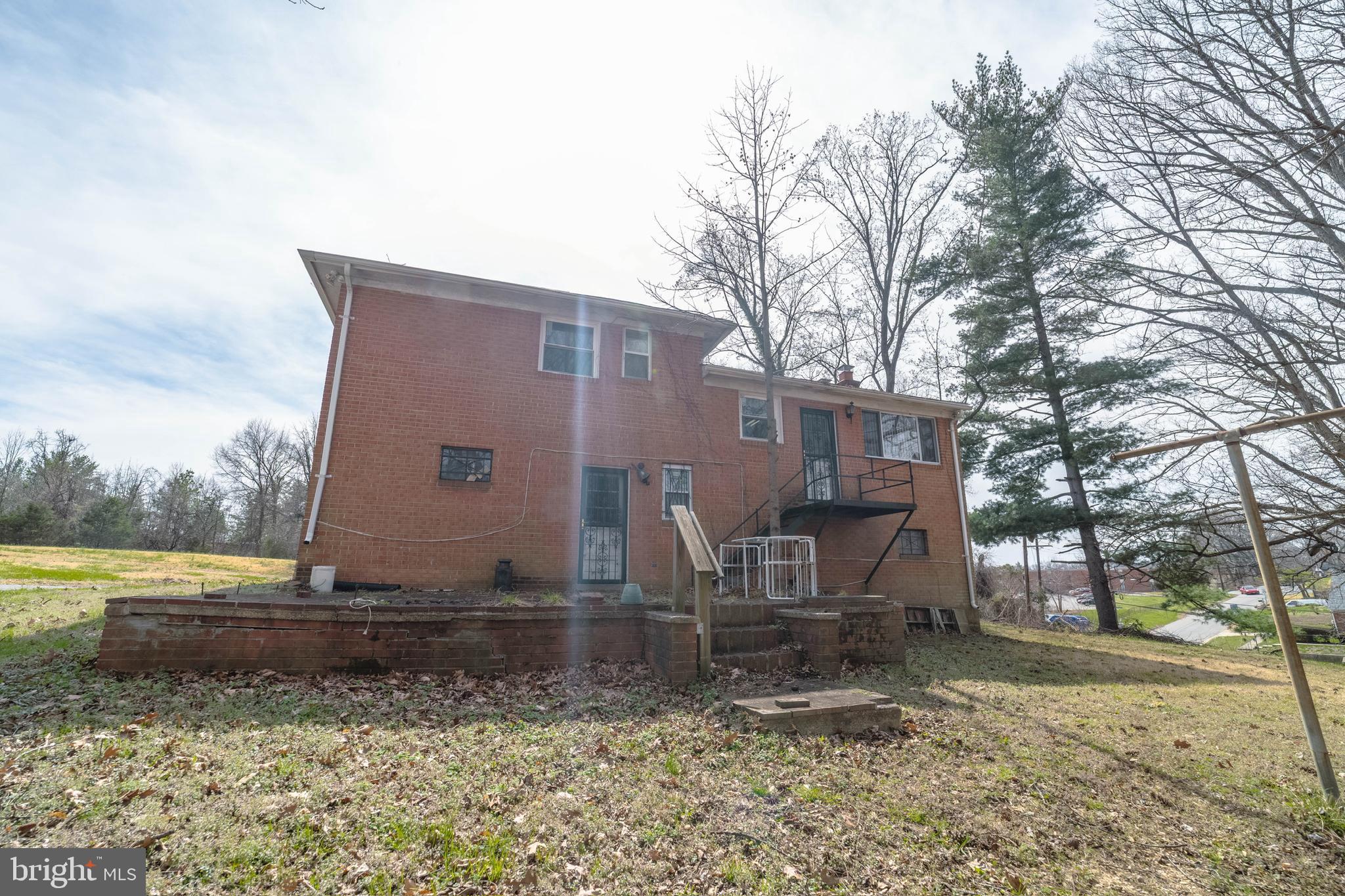 6900 Temple Hill Road Temple Hills, MD 20748 - Photo 43 of 43 a view of a house with a yard