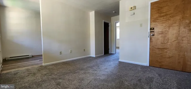 an empty room with an entryway