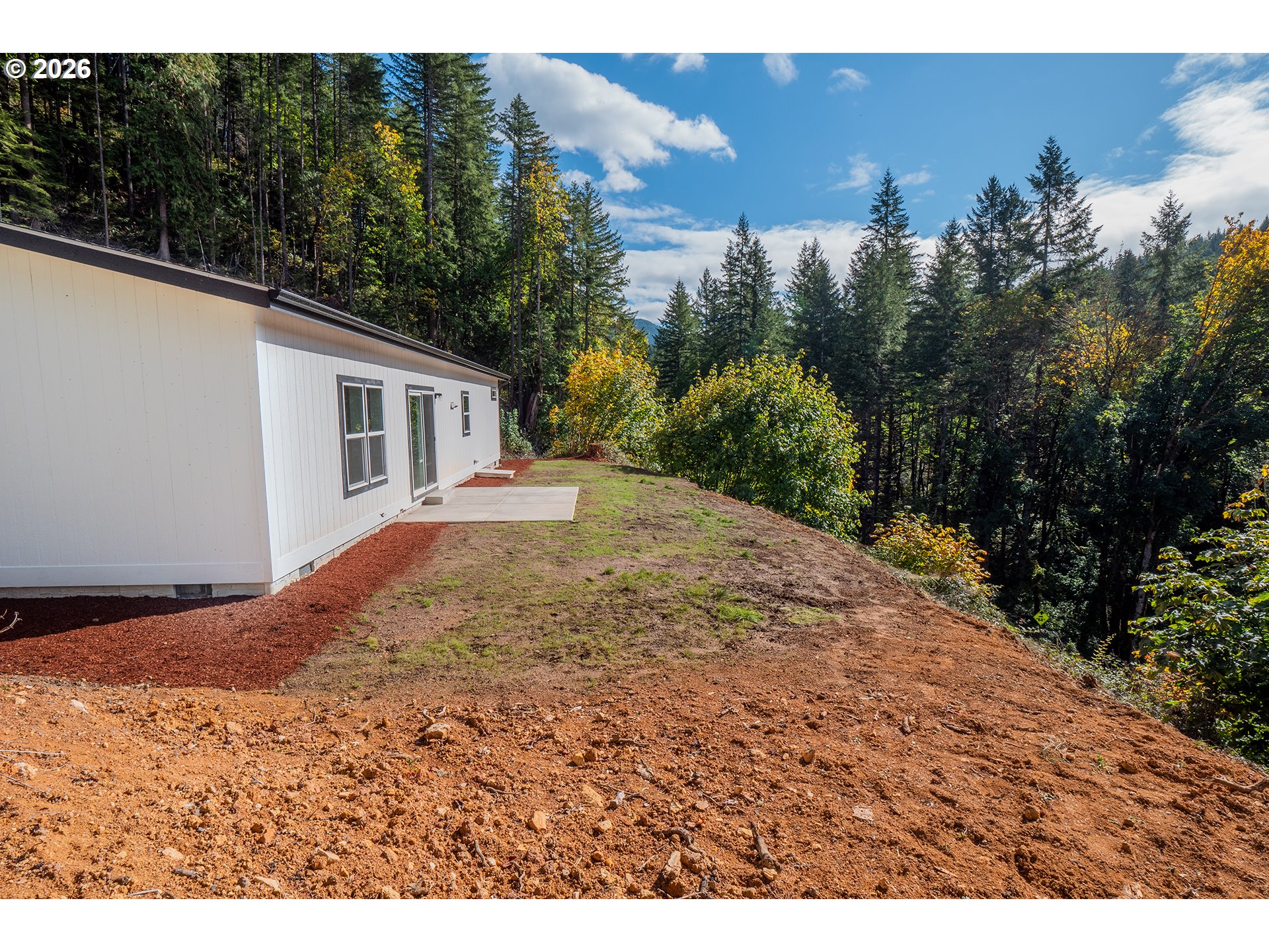 42276 Winberry Creek Road Fall Creek, OR 97438 - Photo 28 of 30 a view of a house with a yard