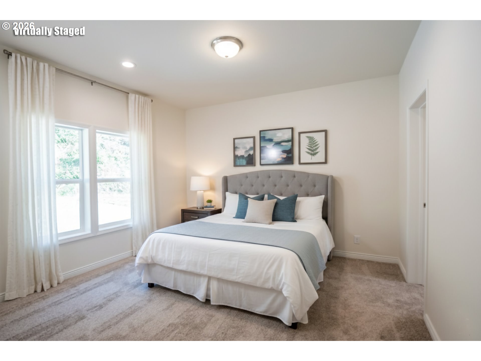 42276 Winberry Creek Road Fall Creek, OR 97438 - Photo 10 of 30 a bedroom with a large bed and a window