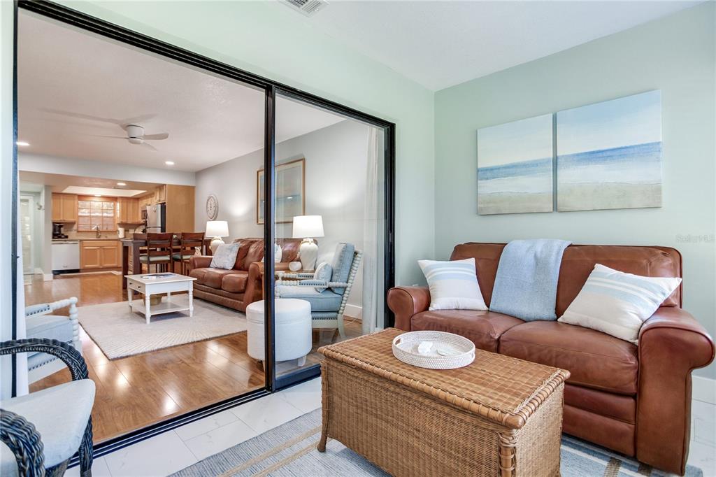 12900 Vonn Road, Unit A204 Largo, FL 33774 - Photo 14 of 40 a living room with furniture and a table