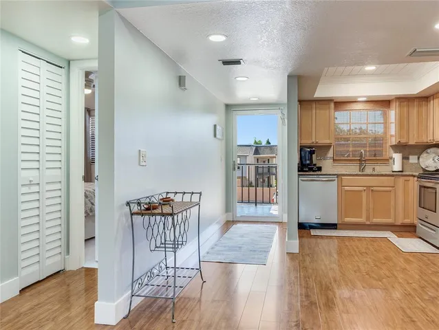 a kitchen with a table and chairs in it