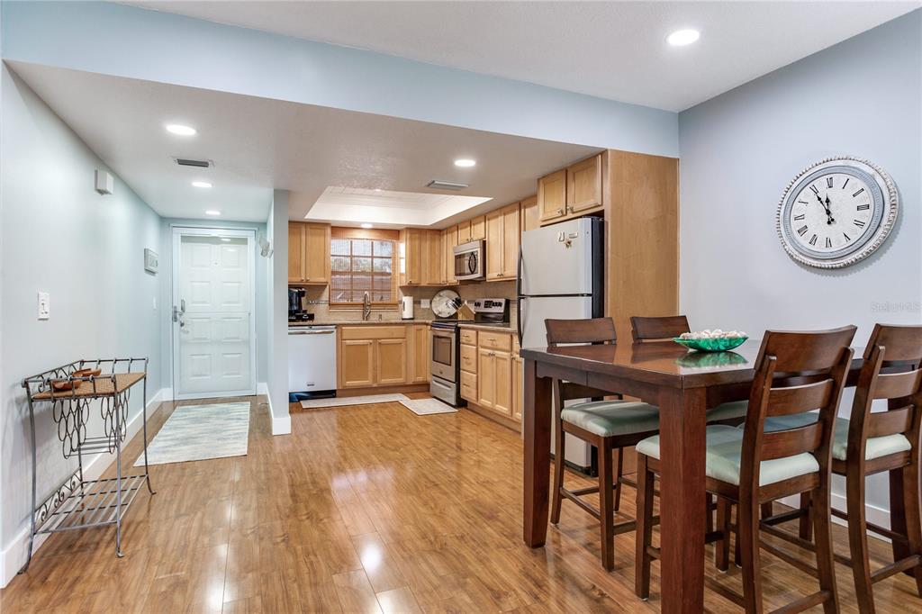 12900 Vonn Road, Unit A204 Largo, FL 33774 - Photo 20 of 40 a view of a dining room with furniture