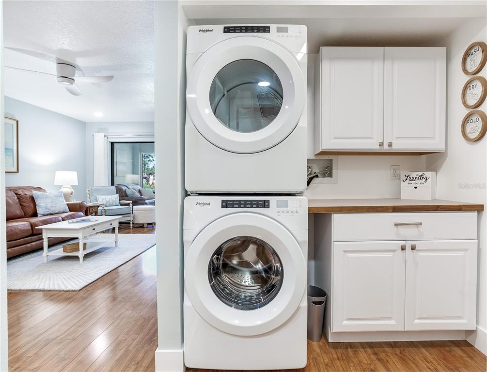 12900 Vonn Road, Unit A204 Largo, FL 33774 - Photo 26 of 40 a living room with furniture and a large window