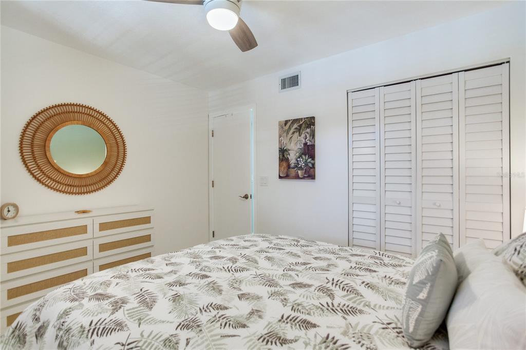 12900 Vonn Road, Unit A204 Largo, FL 33774 - Photo 28 of 40 a bedroom with a bed and a window