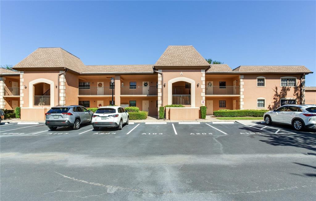 12900 Vonn Road, Unit A204 Largo, FL 33774 - Photo 3 of 40 a car parked in front of a house