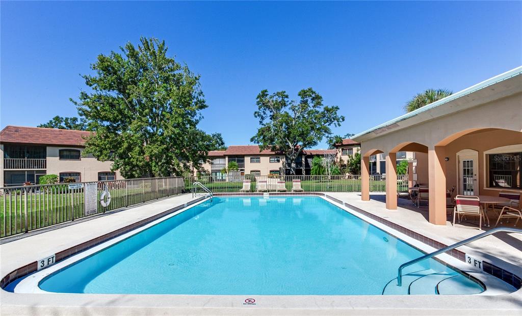 12900 Vonn Road, Unit A204 Largo, FL 33774 - Photo 38 of 40 a view of a house with pool