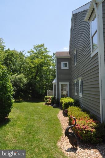 1550 Deer Point Way Reston, VA 20194 - Photo 21 of 30 a view of a house with backyard and sitting area