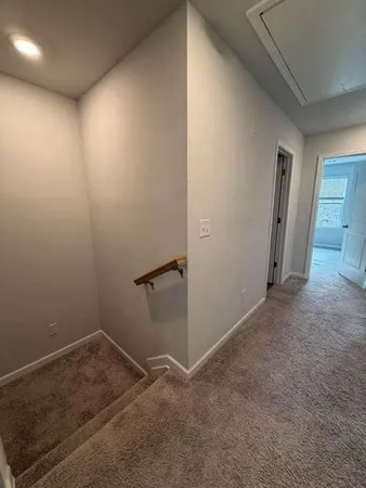 an empty room with an entryway