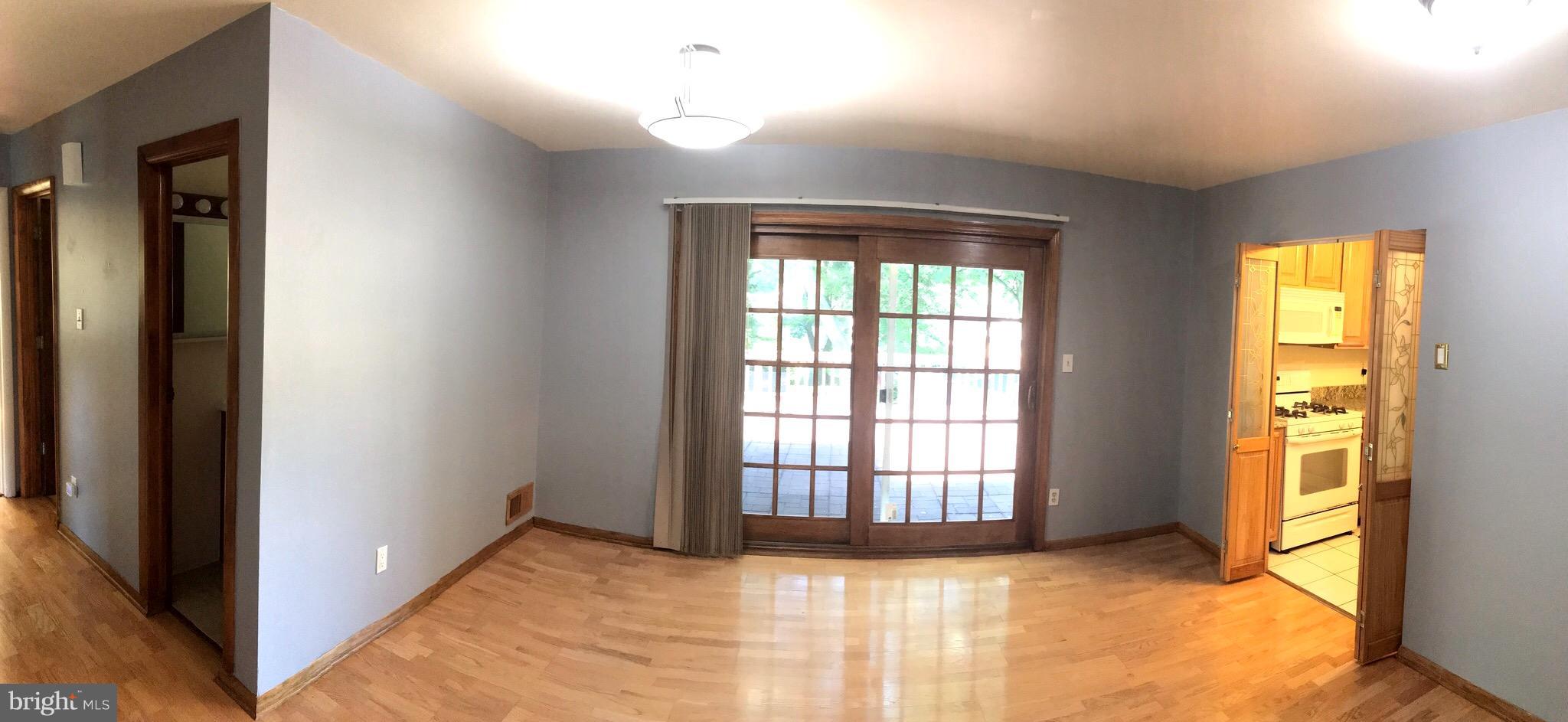 7437 Axton Street Springfield, VA 22151 - Photo 8 of 26 a view of an empty room and window