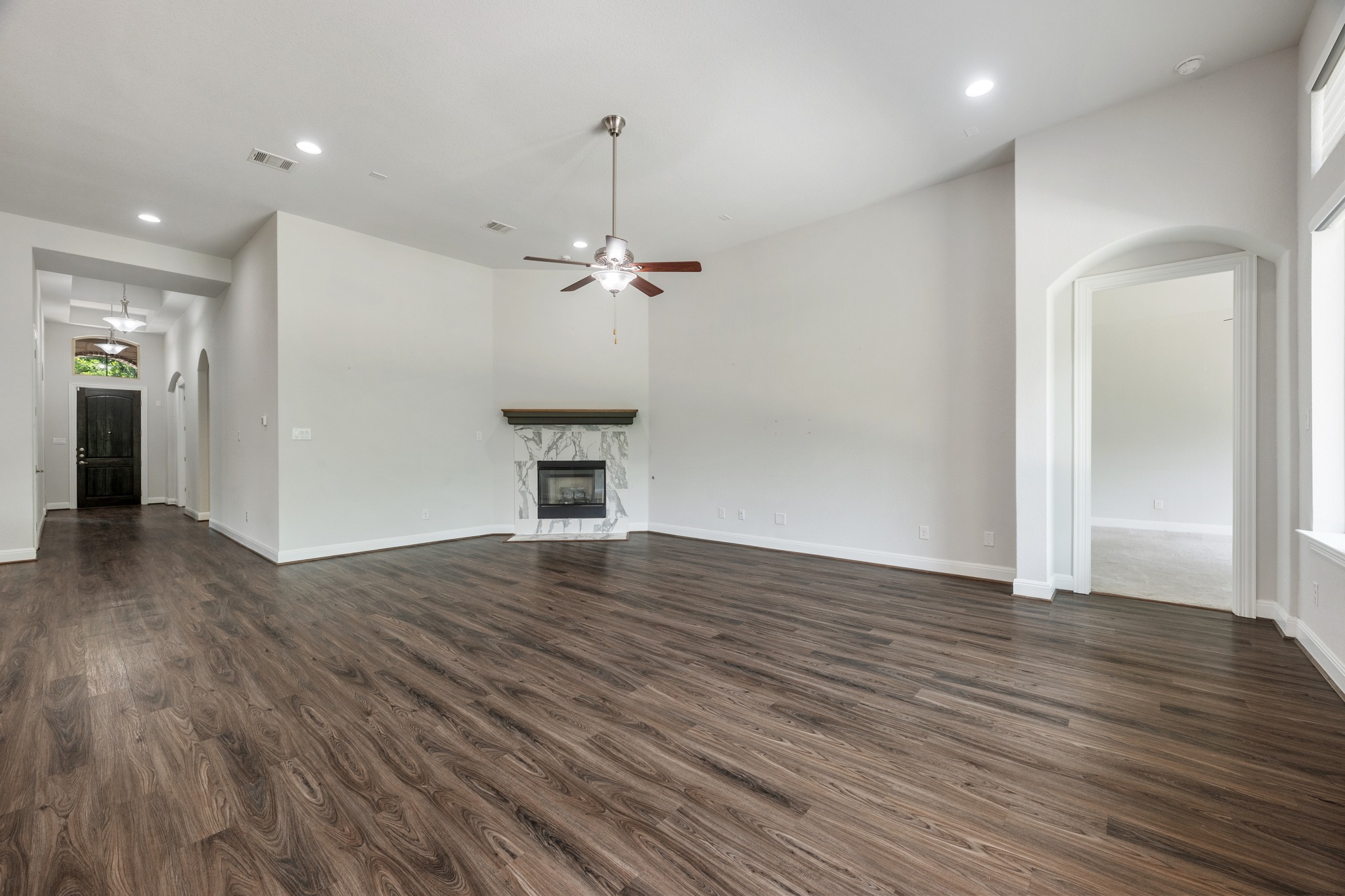 2709 Steece Way Leander, TX 78641 - Photo 16 of 39 a view of empty room with wooden floor