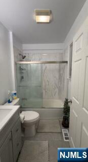59 Spring Valley Avenue Hackensack, NJ 07601 - Photo 20 of 26 a bathroom with a sink a toilet and shower