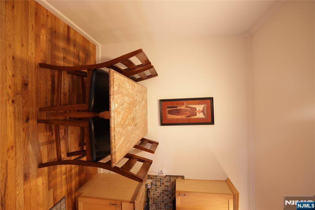 59 Spring Valley Avenue Hackensack, NJ 07601 - Photo 6 of 26 a view of a workspace with furniture