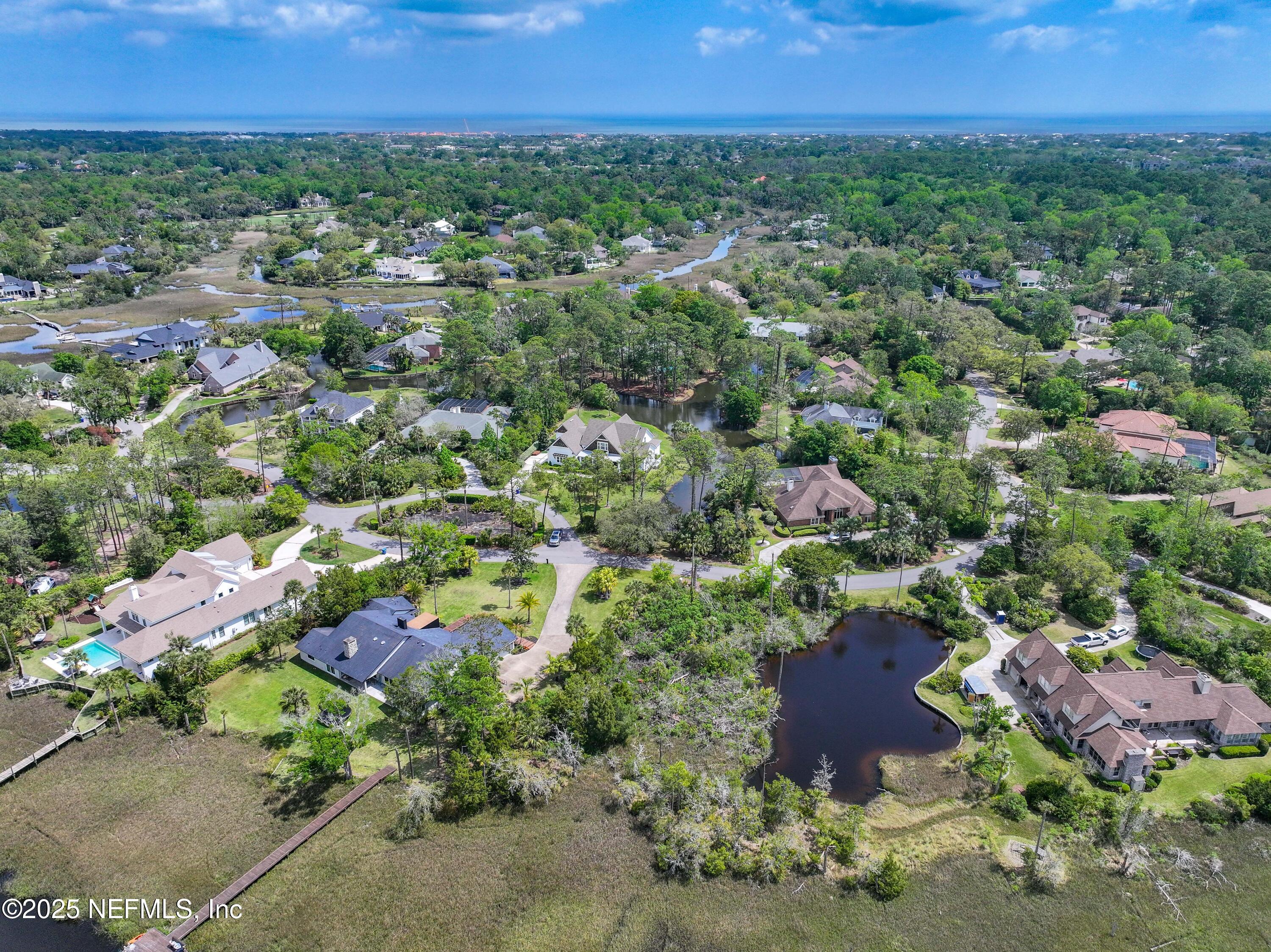 24631 Deer Trace Drive Ponte Vedra Beach, FL 32082 - Photo 13 of 33 a view of a city and a forest