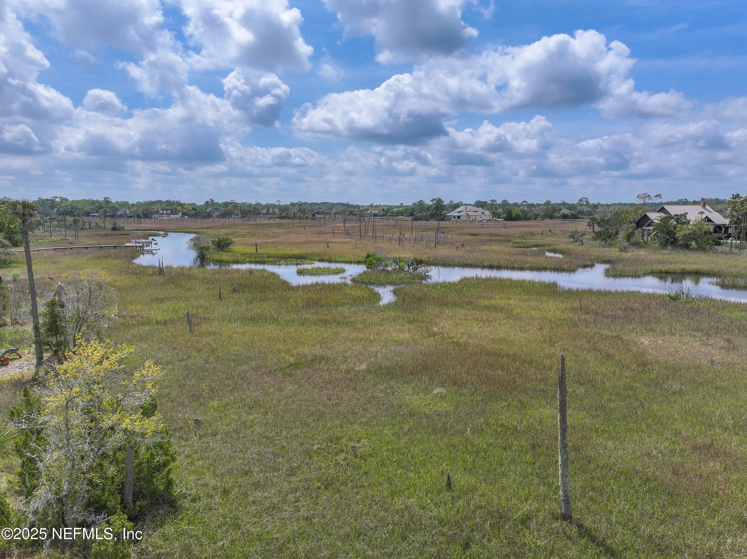 24631 Deer Trace Drive Ponte Vedra Beach, FL 32082 - Photo 21 of 33 a view of a lake with a city