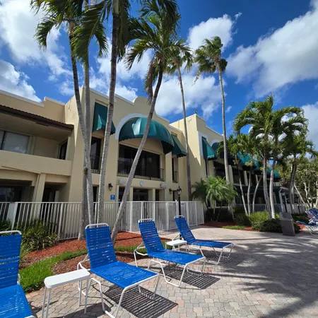 a view of a house with a swimming pool
