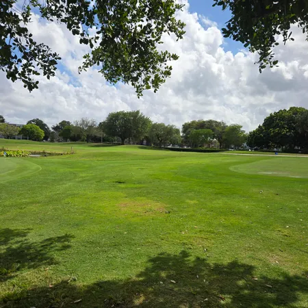 a view of swimming pool with trees