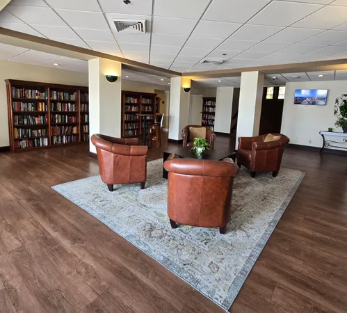 a street view with large trees