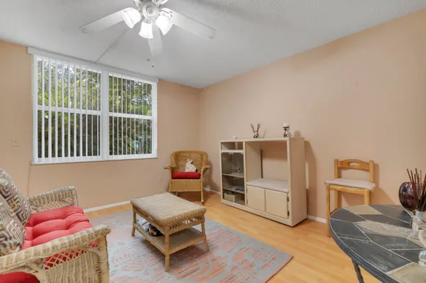 a living room with furniture and a window