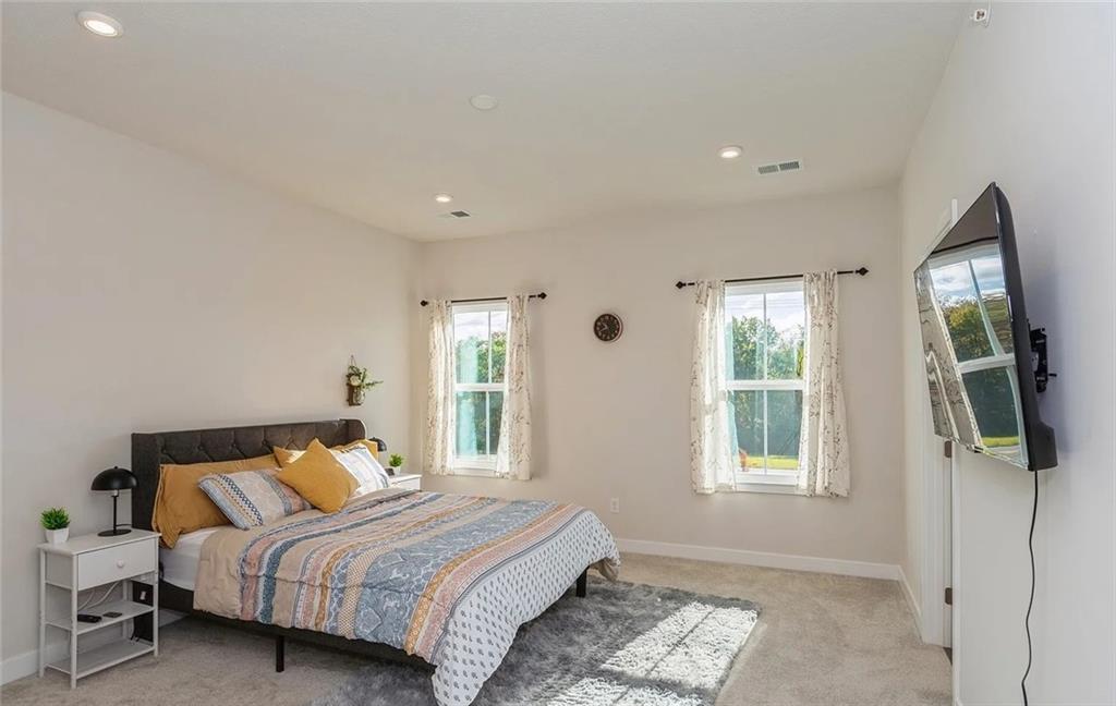 6702 Sycamore Way Gibsonia, PA 15044 - Photo 14 of 29 a bedroom with a bed and wooden floor