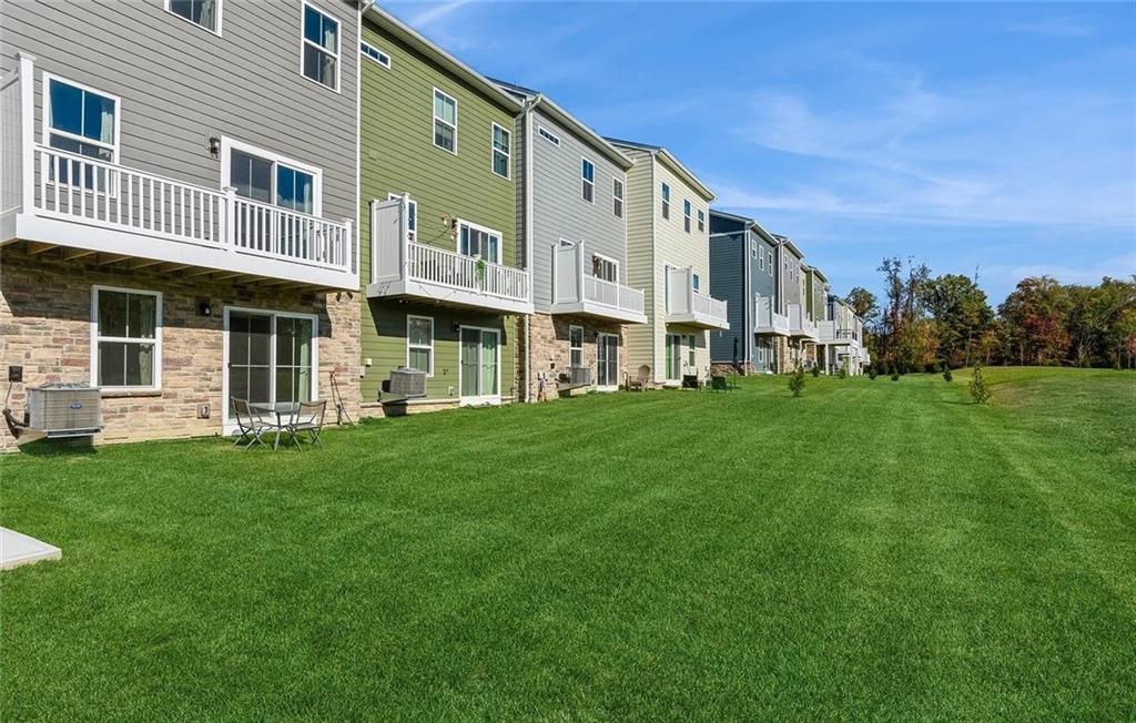 6702 Sycamore Way Gibsonia, PA 15044 - Photo 25 of 29 a front view of a building with a garden