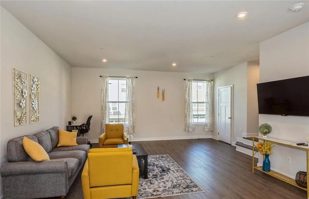 6702 Sycamore Way Gibsonia, PA 15044 - Photo 6 of 29 a living room with furniture and a flat screen tv