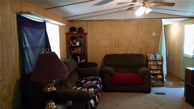 8255 Pinewood Road Nunnelly, TN 37137 - Photo 6 of 13 Open living room with ceiling fan