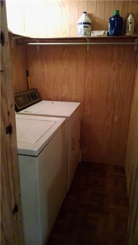 8255 Pinewood Road Nunnelly, TN 37137 - Photo 7 of 13 Laundry Room with shelf