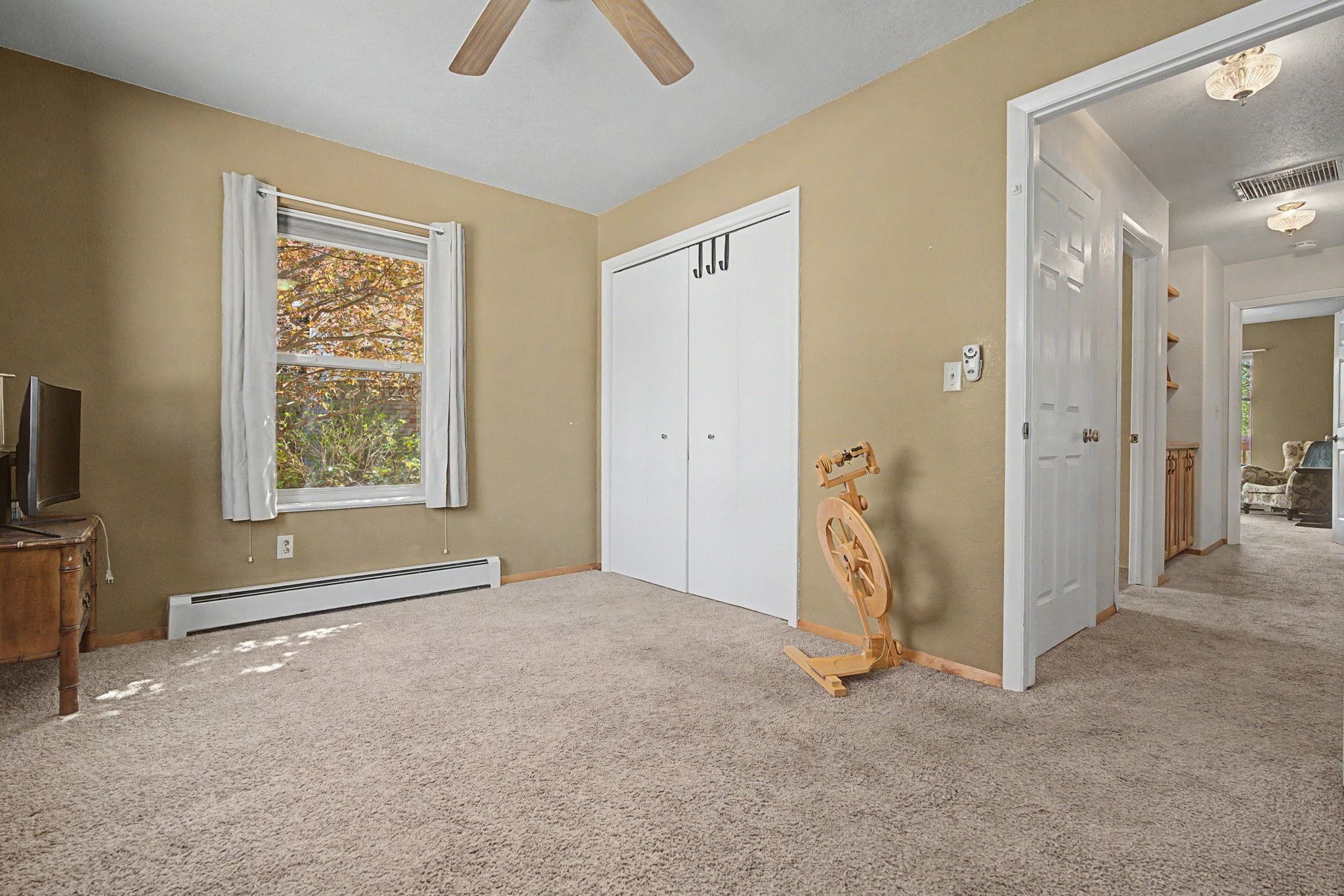 539 1/2 Ridgestone Court Grand Junction, CO 81507 - Photo 12 of 31 an empty room with windows and closet