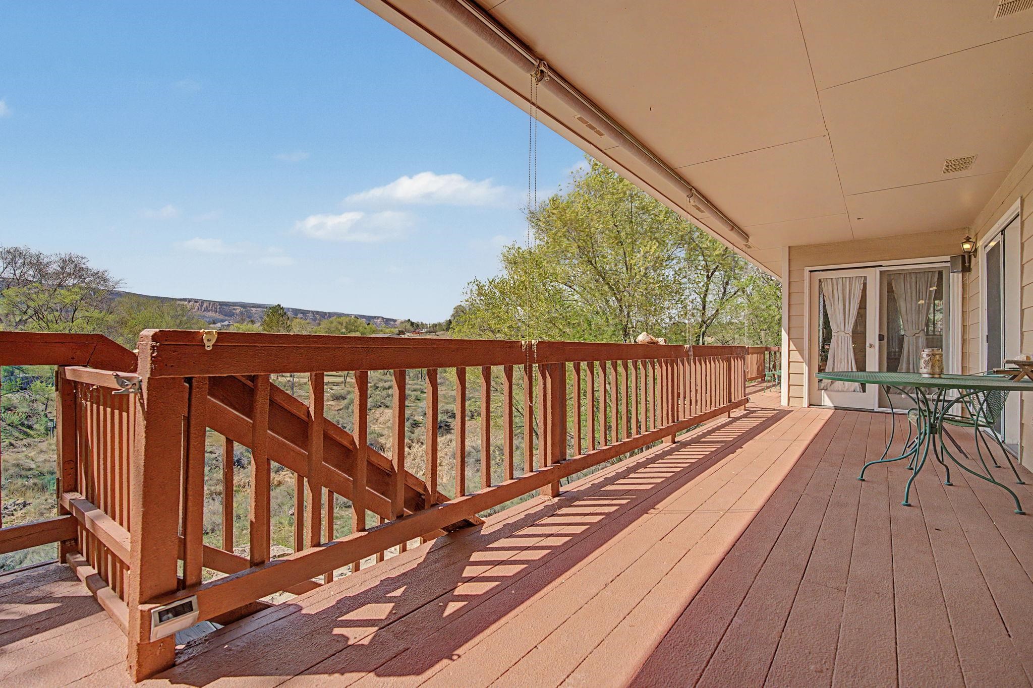 539 1/2 Ridgestone Court Grand Junction, CO 81507 - Photo 28 of 31 a view of balcony with wooden floor and fence