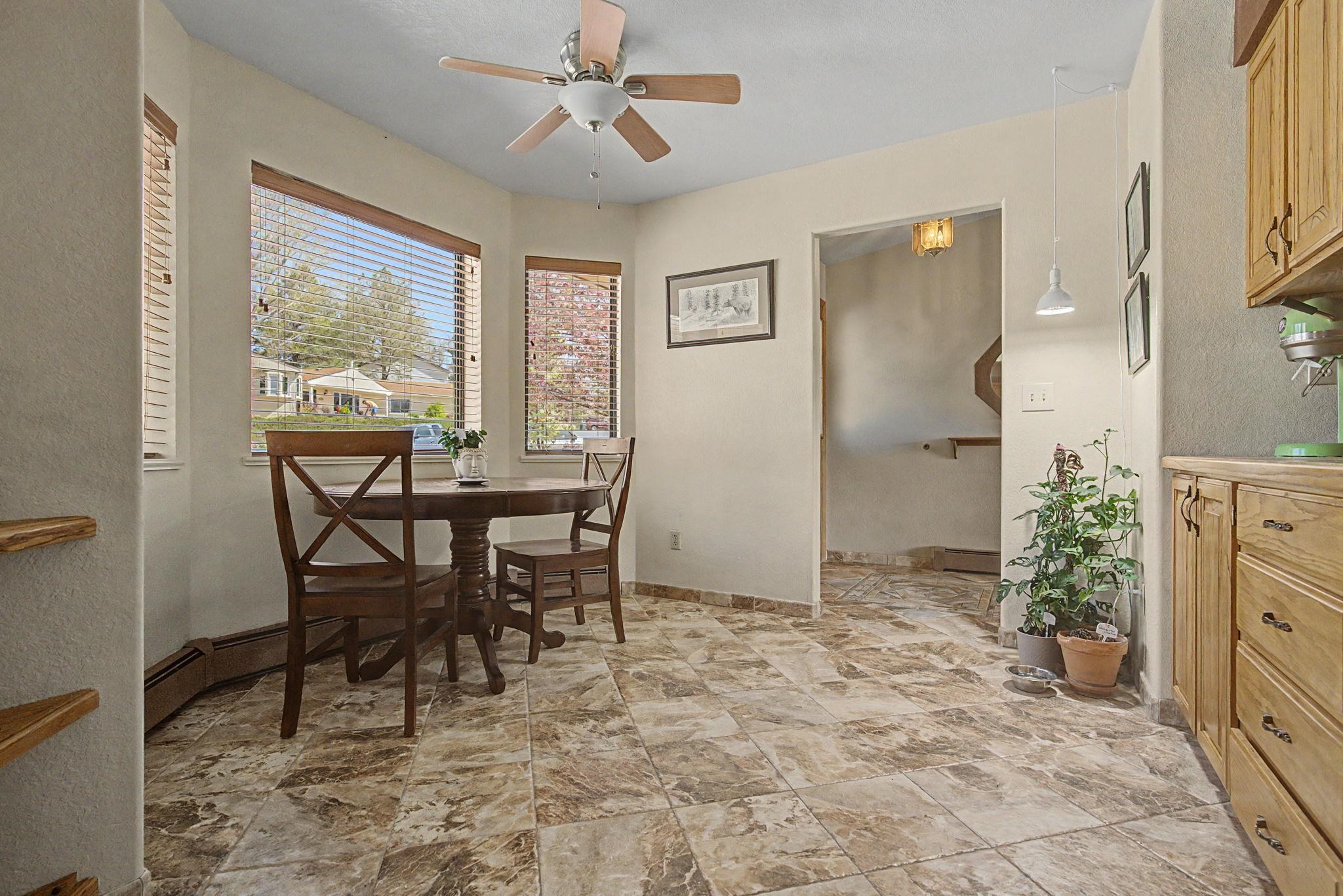 539 1/2 Ridgestone Court Grand Junction, CO 81507 - Photo 4 of 31 a view of a dining room with furniture window and outside view