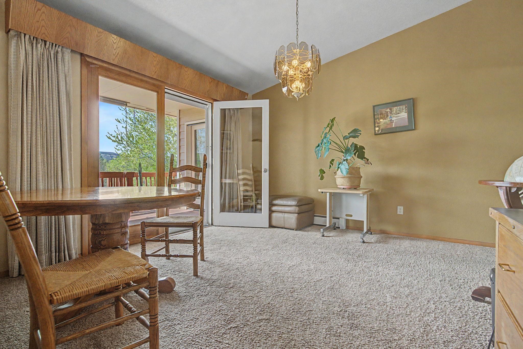 539 1/2 Ridgestone Court Grand Junction, CO 81507 - Photo 8 of 31 a view of a livingroom with furniture window and outside view