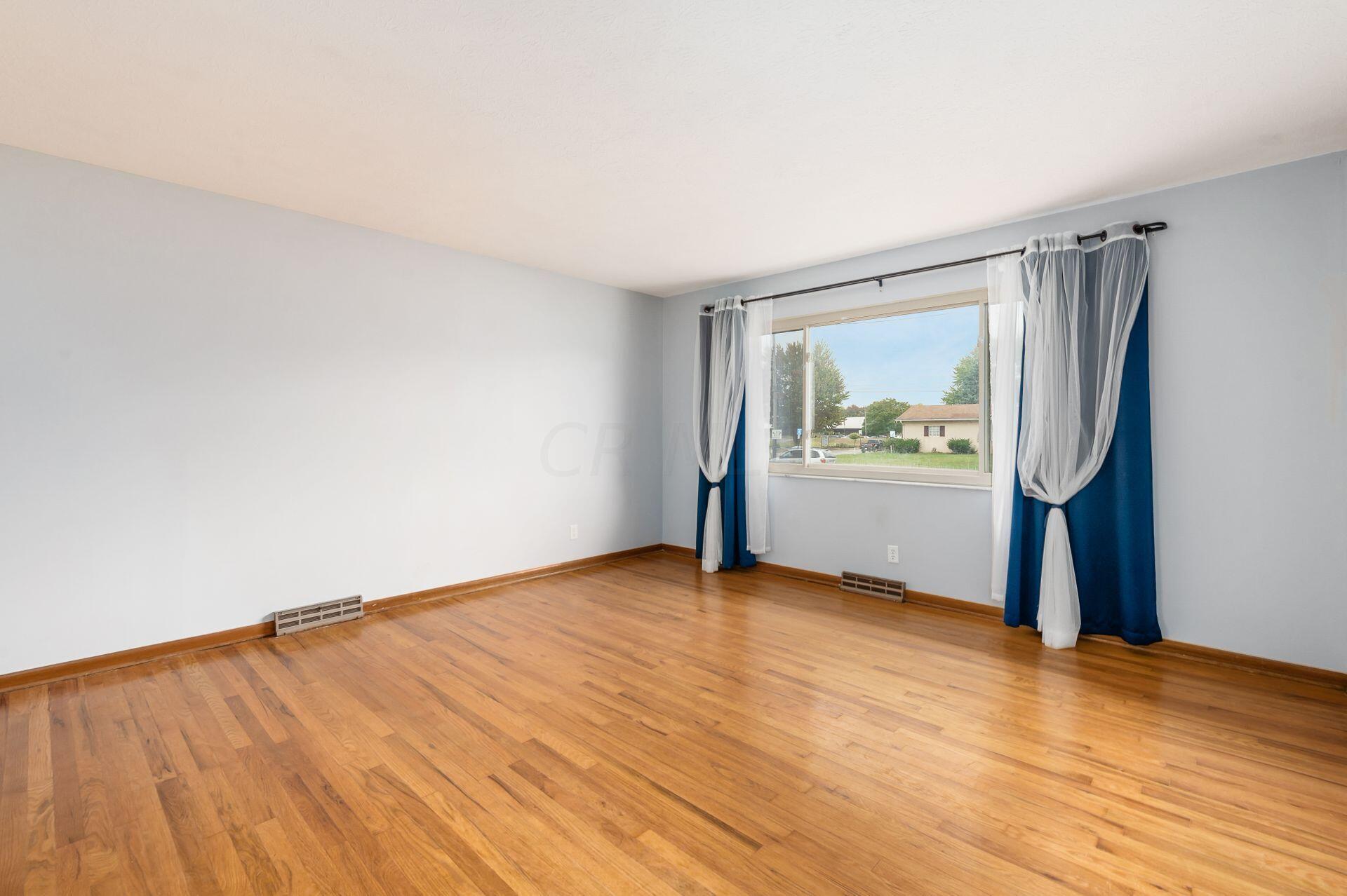 5355 Karl Road Columbus, OH 43229 - Photo 10 of 39 LIVING ROOM WITH BEAUTIFUL HARDWOOD FLOORS