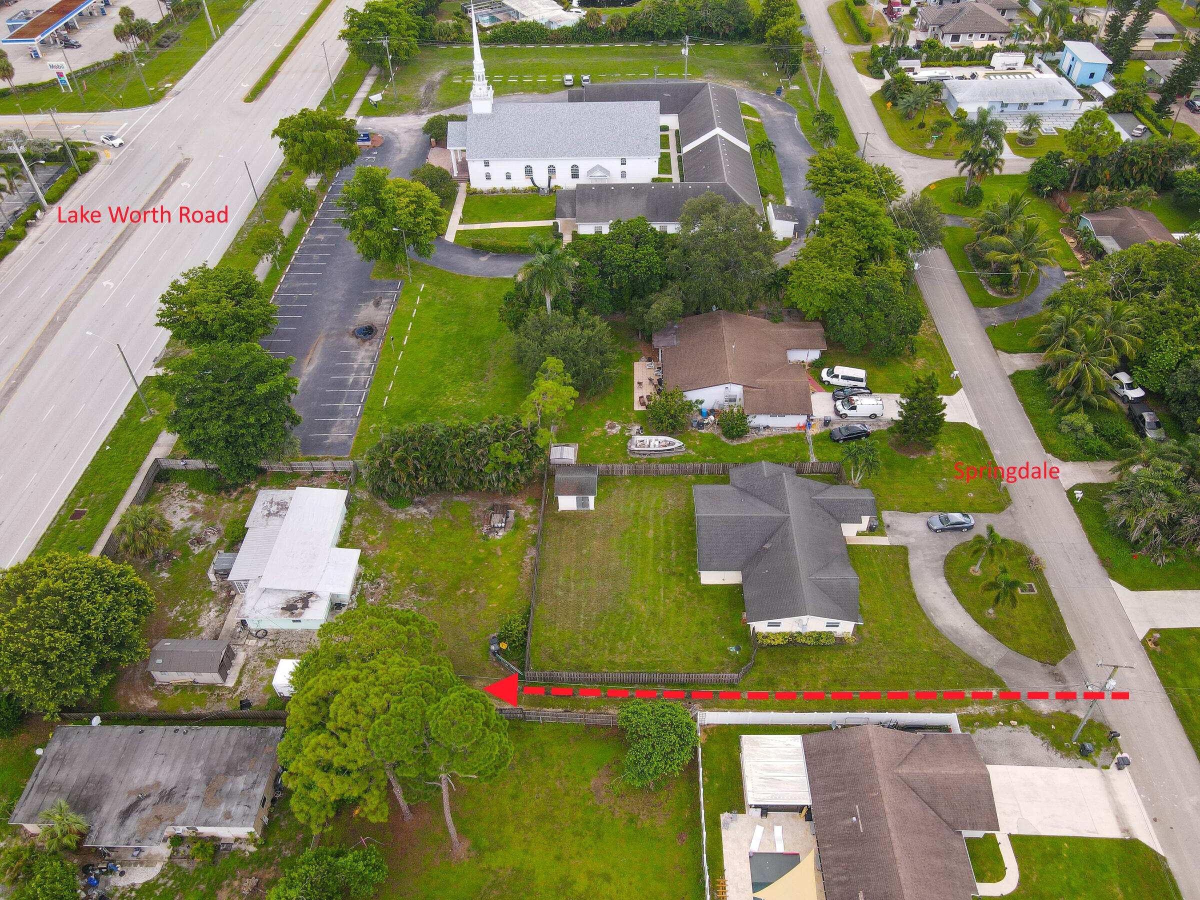 122 Springdale Road Lake Worth, FL 33467 - Photo 13 of 16 an aerial view of house with a yard
