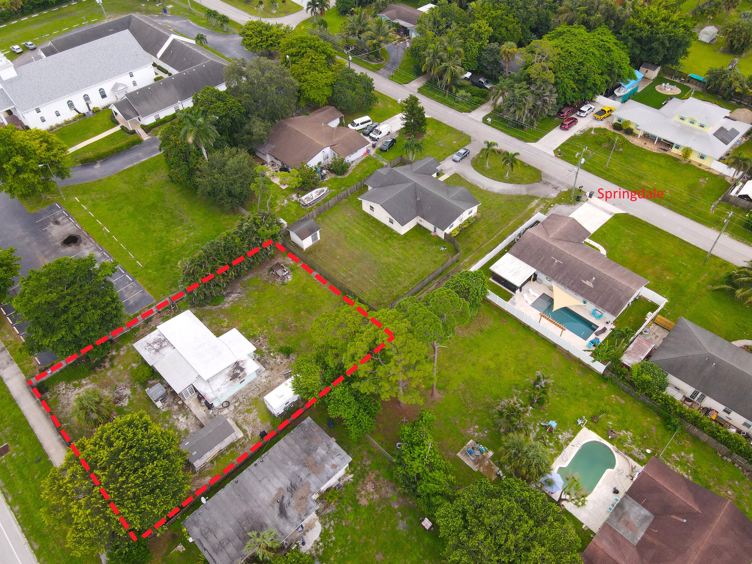 122 Springdale Road Lake Worth, FL 33467 - Photo 14 of 16 an aerial view of a house with a yard