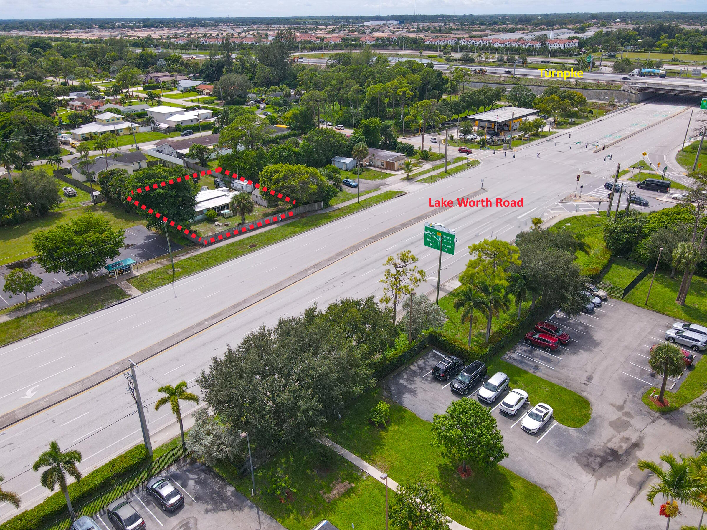 122 Springdale Road Lake Worth, FL 33467 - Photo 2 of 16 an aerial view of a city