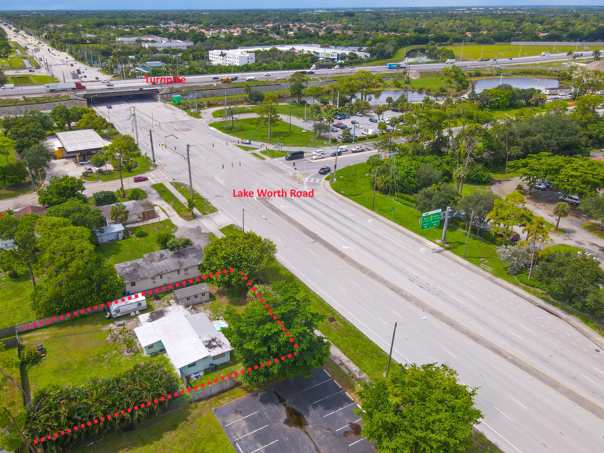 122 Springdale Road Lake Worth, FL 33467 - Photo 3 of 16 an aerial view of lake residential houses with outdoor space and swimming pool
