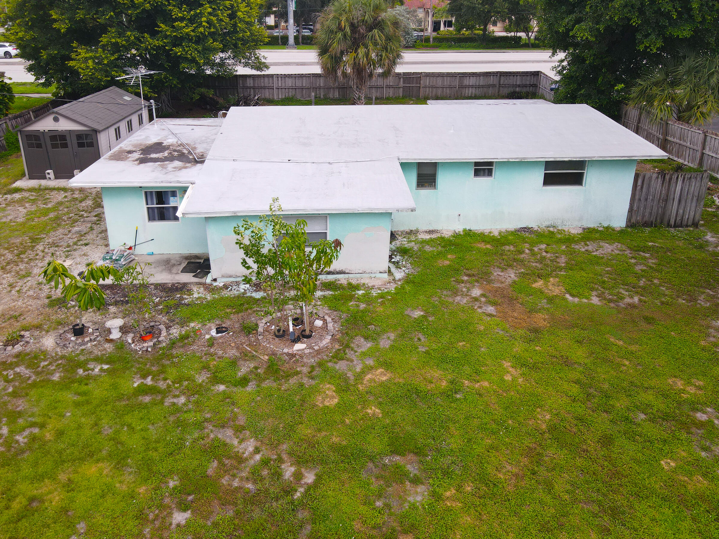 122 Springdale Road Lake Worth, FL 33467 - Photo 5 of 16 a view of house with garden