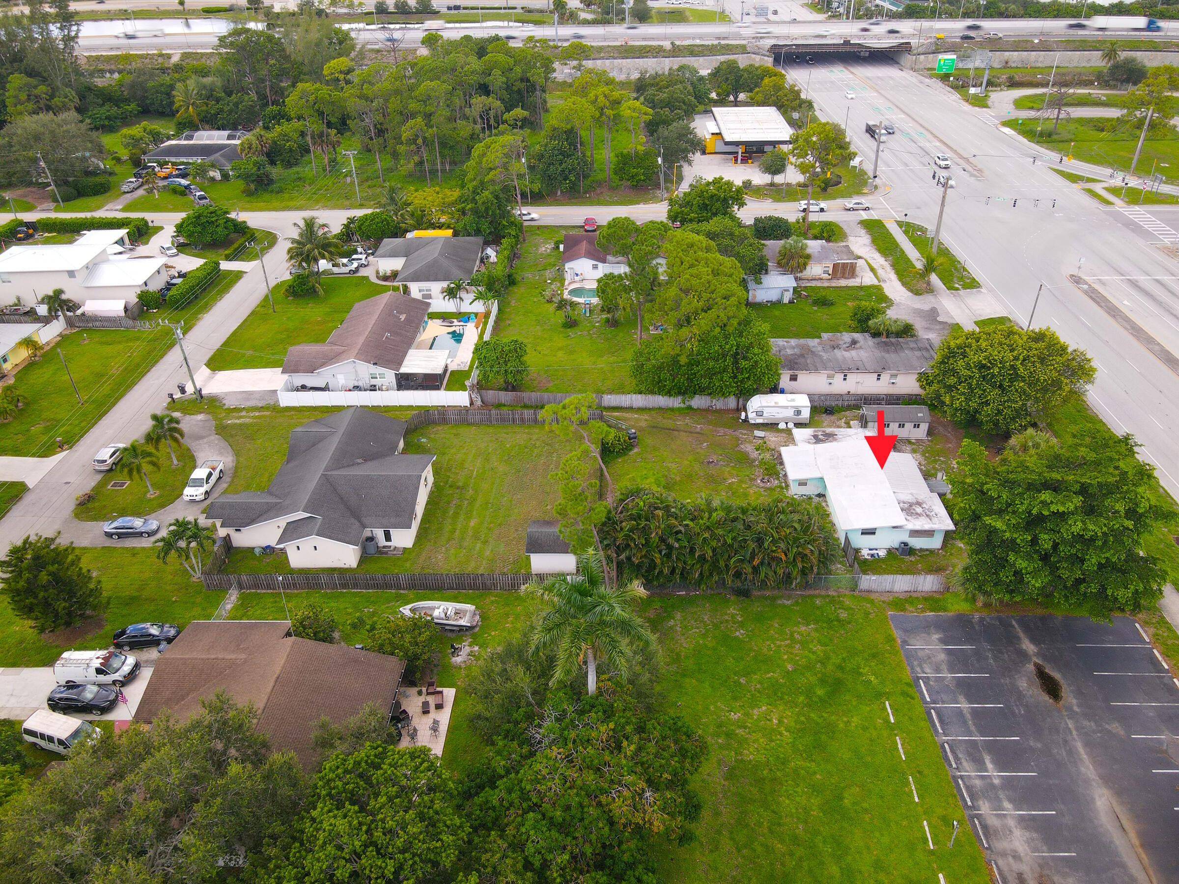 122 Springdale Road Lake Worth, FL 33467 - Photo 9 of 16 an aerial view of residential houses with outdoor space and swimming pool
