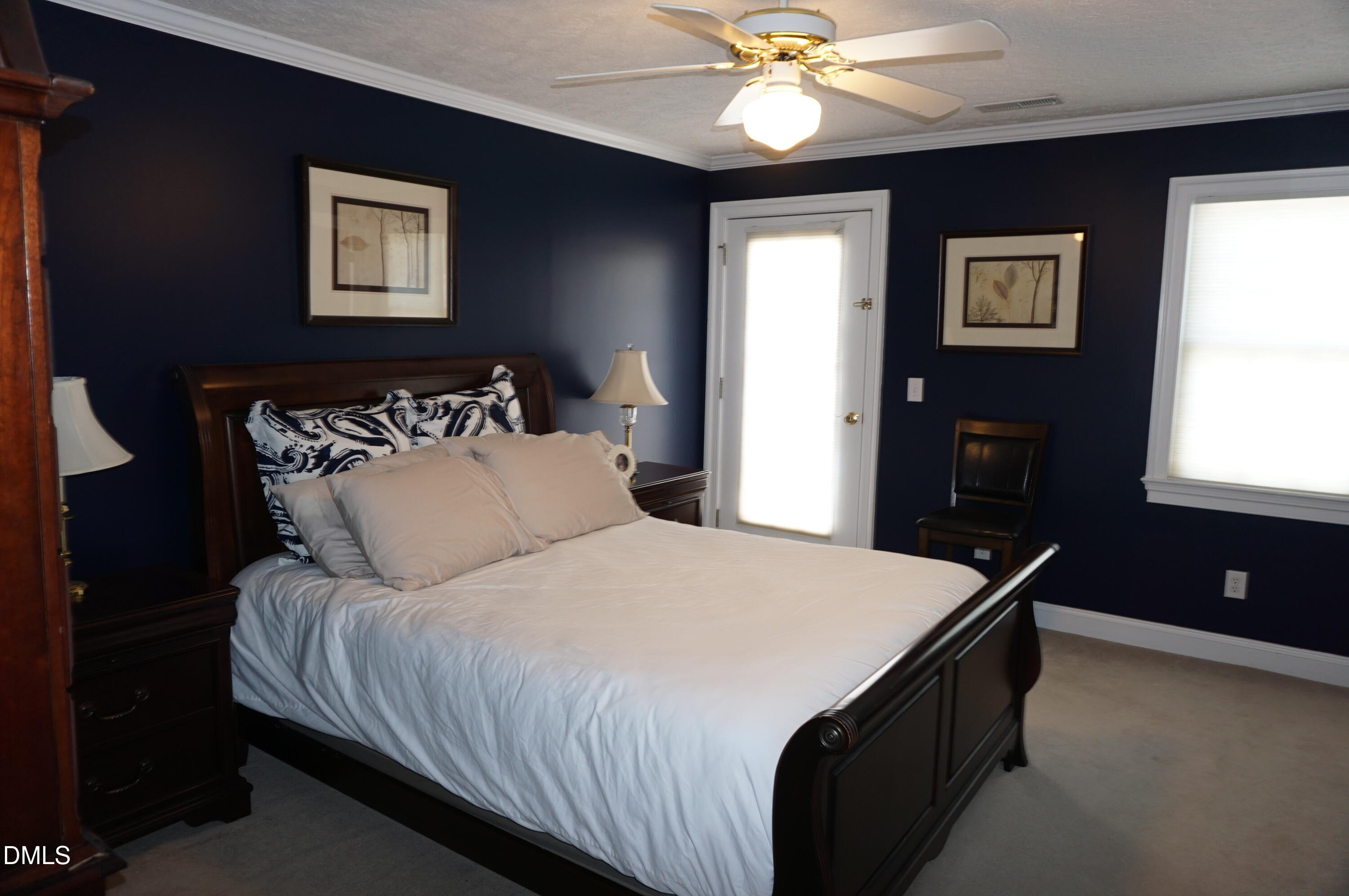 2125 Keith Hills Road Lillington, NC 27546 - Photo 41 of 66 a bedroom with bed and window